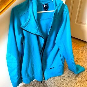 Bright blue asymmetrical women’s Nike hoodie